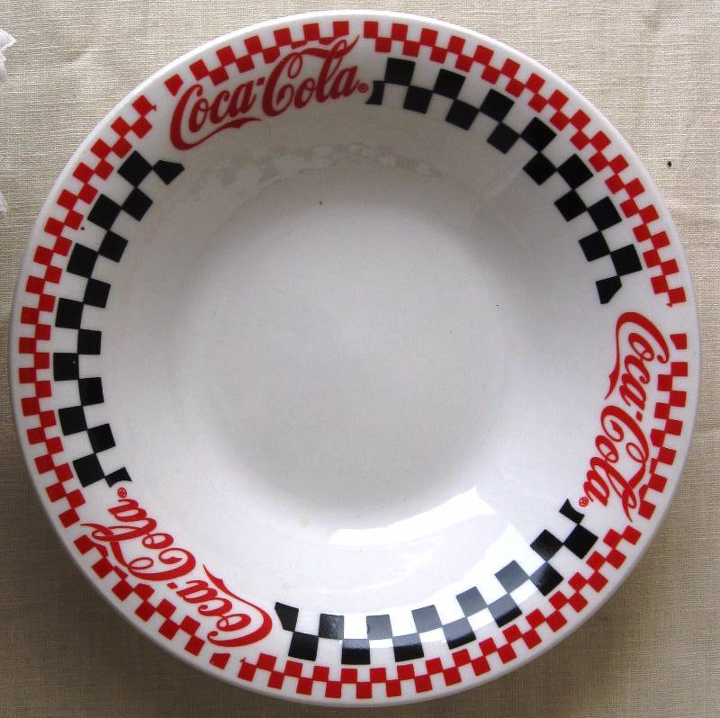 lot 18 image: 12 place setting Coca-Cola Dinnerware by Gibson