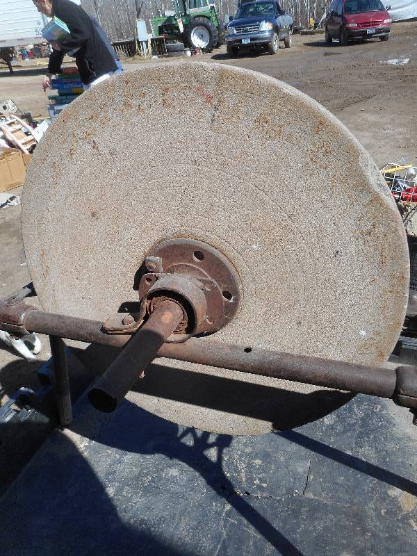 ANTIQUE GRINDING STONE AND STAND