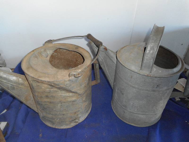 2 VINTAGE METAL WATERING CANS