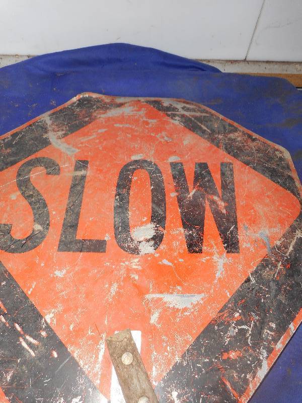 SLOW SIGN AND STOP SIGN
