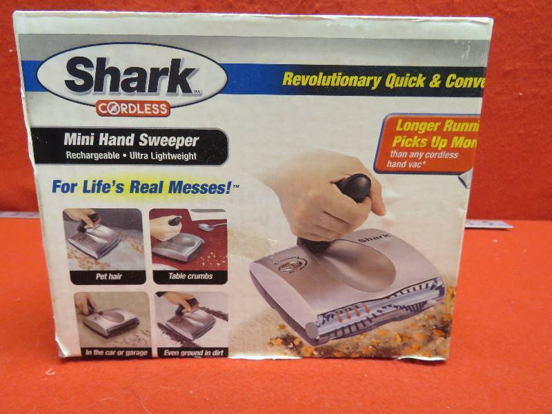 lot 31 image: Shark Mini Hand Sweeper