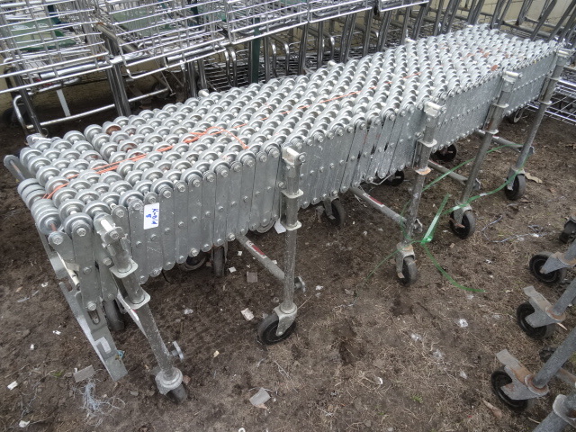 lot 5 image: Accordian style conveyor track. Nes...