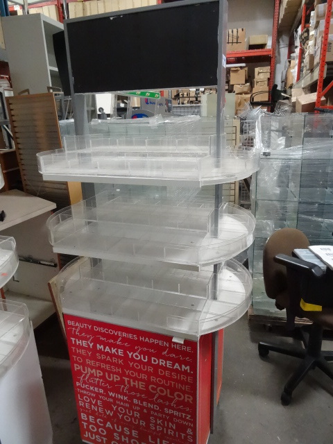 lot 28 image: Retail store fixture on wheels. 4 s...