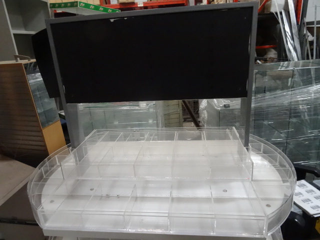 lot 29 image: Retail store fixture on wheels. 4 s...