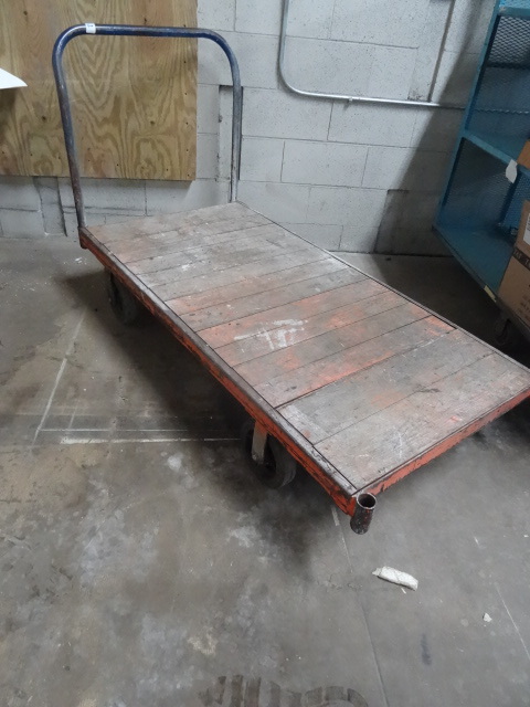 lot 52 image: Heavy duty 4 wheel warehouse cart. ...