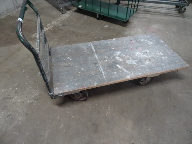 lot 84 image: Heavy duty 4 wheel warehouse cart. ...