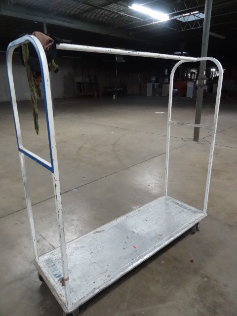 lot 87 image: 4 wheel cart for clothing or other ...