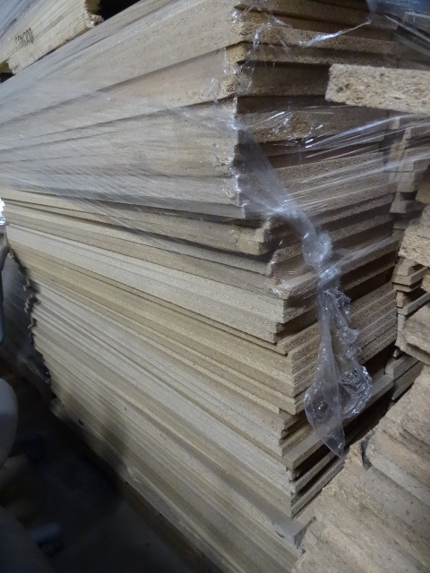 lot 110 image: 12 x 48 shelf boards. Approx 210 bo...