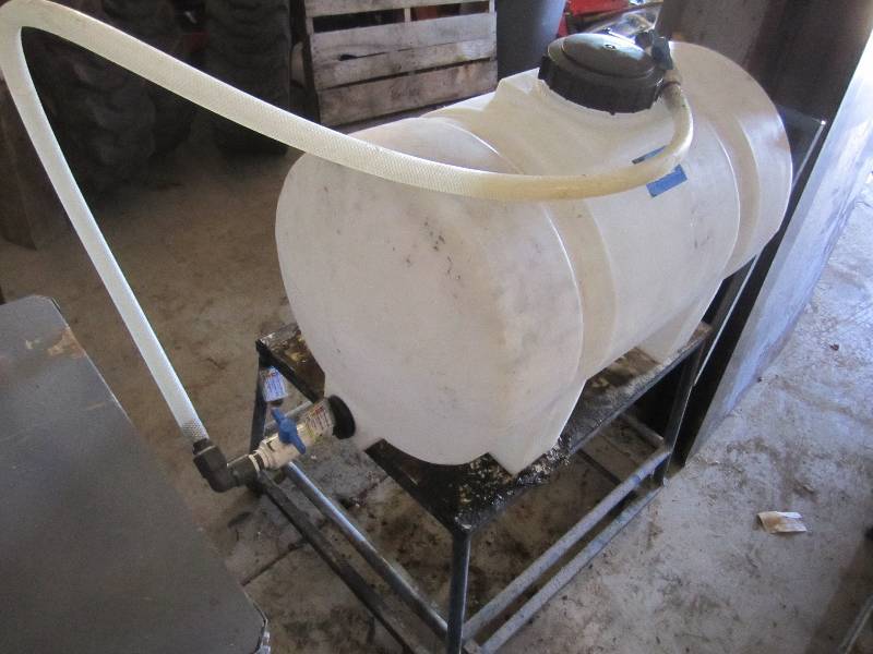 lot 15 image: Plastic tank with hose and valve, s...