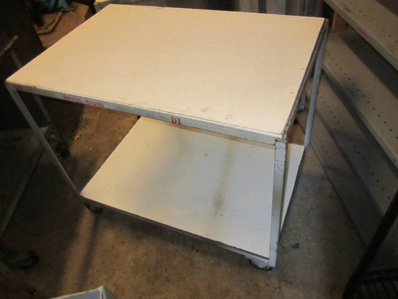 lot 25 image: Work table on wheels...