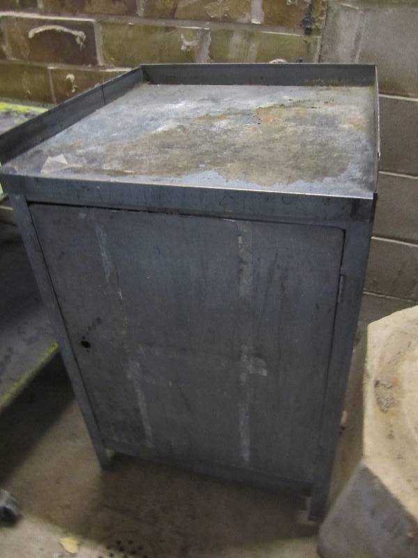lot 32 image: Metal work stand with cabinet below...
