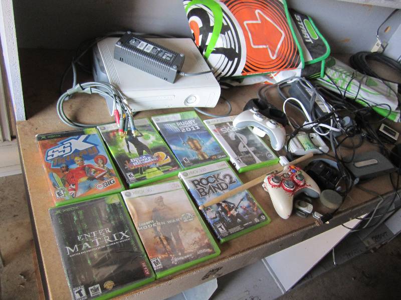 lot 51 image: X Box 360, games, controllers and a...