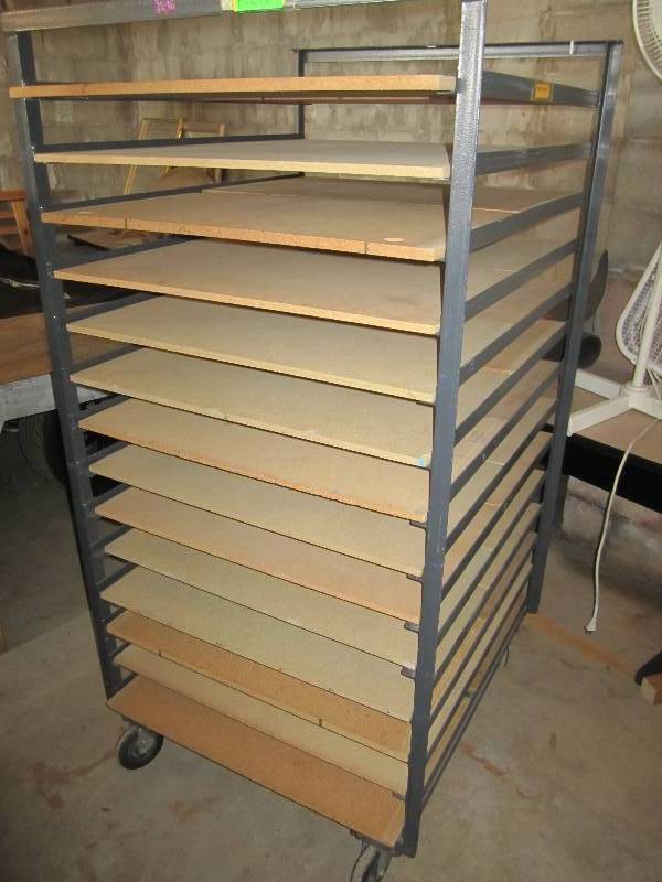 lot 65 image: Sorter shelf on wheels...