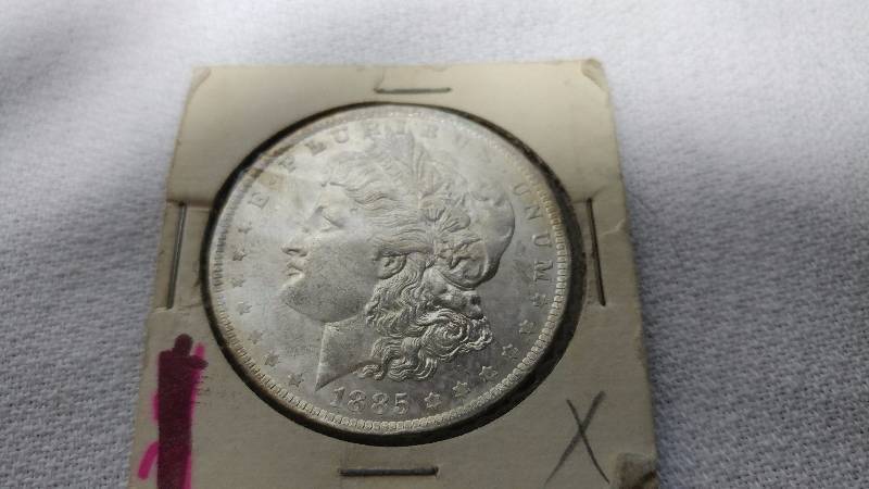 1885-O MORGAN SILVER DOLLAR