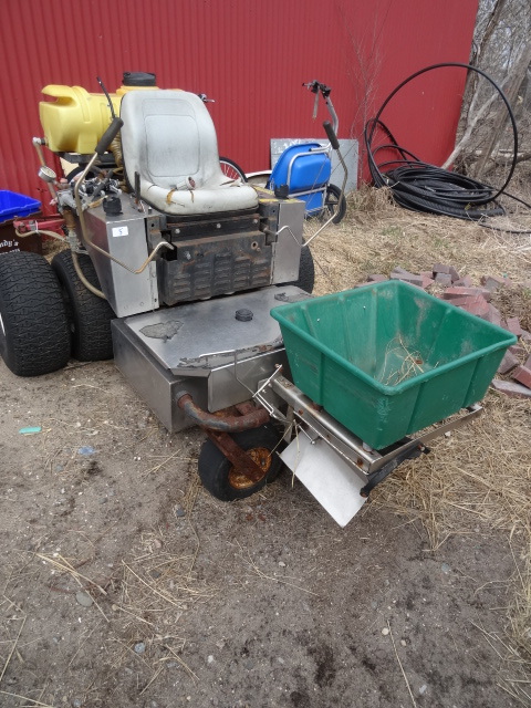 lot 5 image: Zero turn zero turn lawn fertilizer spreader and spray unit.