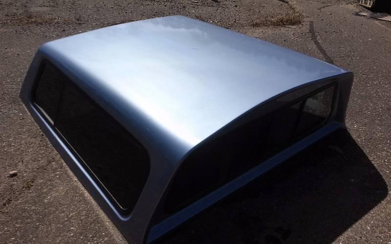 lot 1 image: Raven 6FT Truck Topper with Slide Window, nice condition.