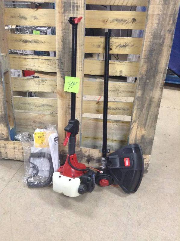 lot 97 image: Toro Commercial Grade Engine 2 cycle straight Shaft gas trimmer
