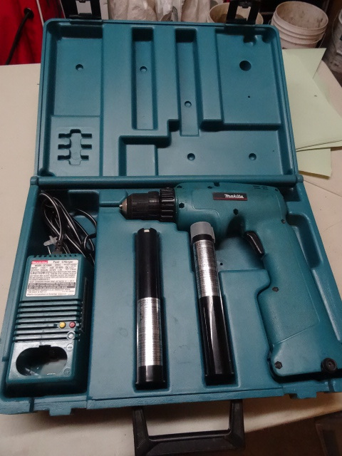 Makita 9.6 volt drill with 2 batter...
