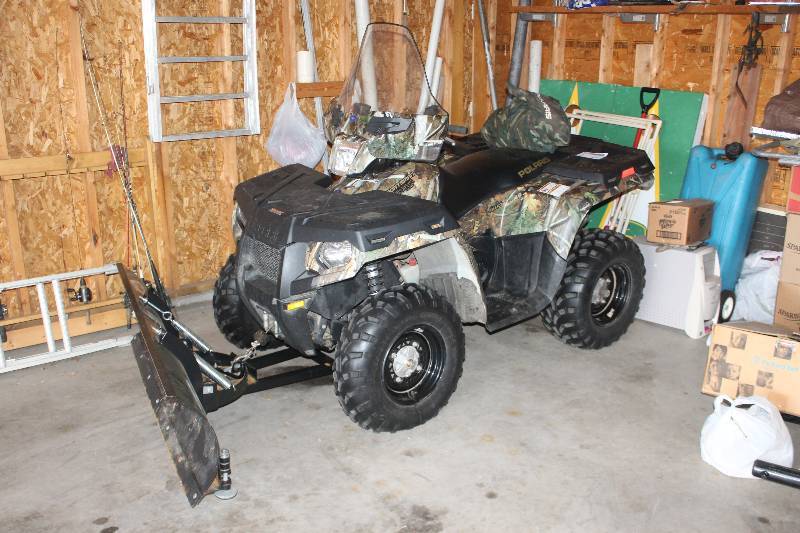 lot 2 image: 2012 Polaris ATV w Plow Attachment, Cover