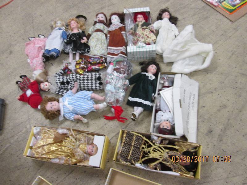 lot of ceramic dolls and clowns som...