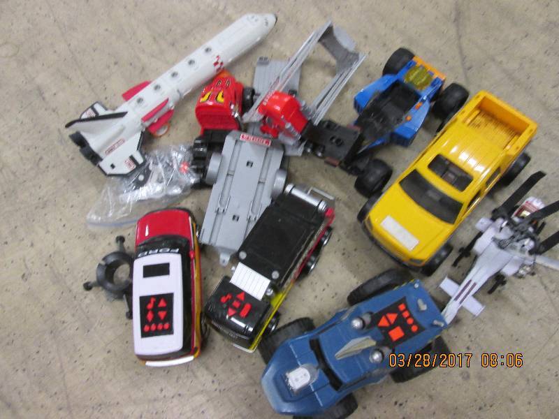 lot of big toys trucks, helicopter,...