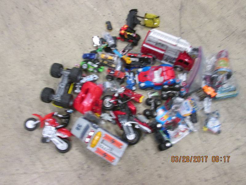 lot of small cars, trucks, motorcyc...