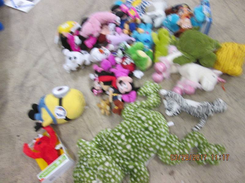 big lot of stuffed toys lots of dis...