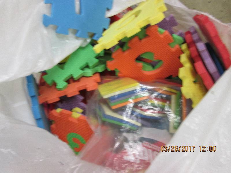 bag of floor alphabet puzzles and a...
