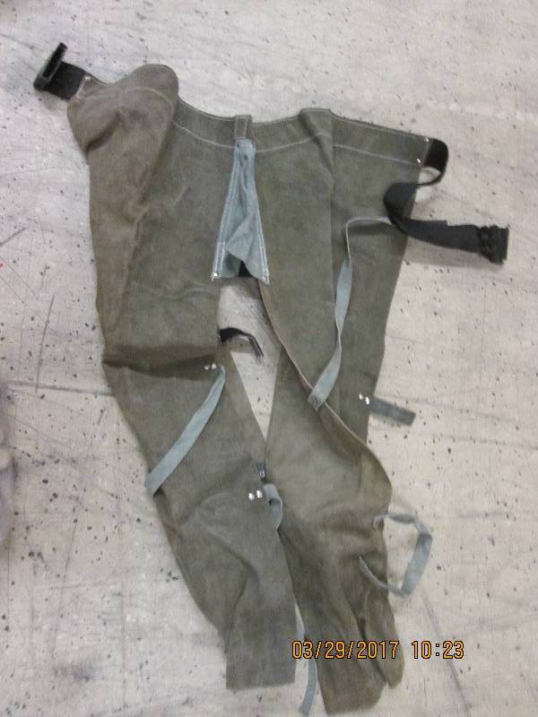 used welding apron and 4 pairs of c...