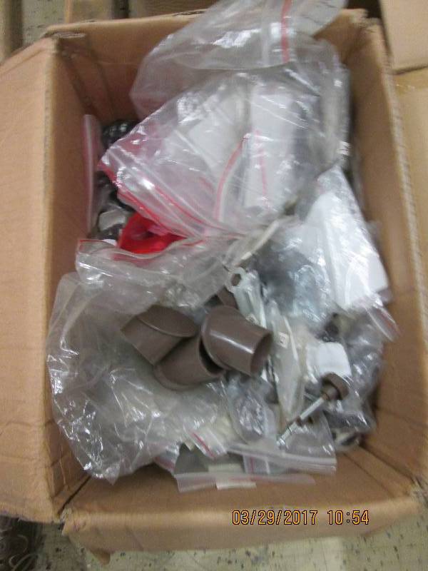 box of new furniture hardware kits ...