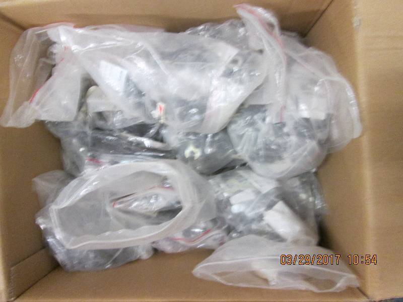 box of new furniture hardware kits ...