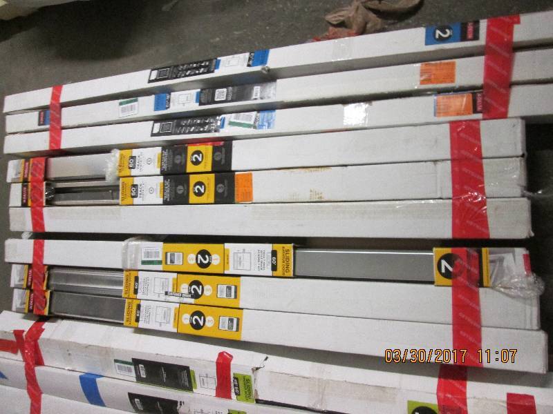 big lot of sliding shower doors fra...