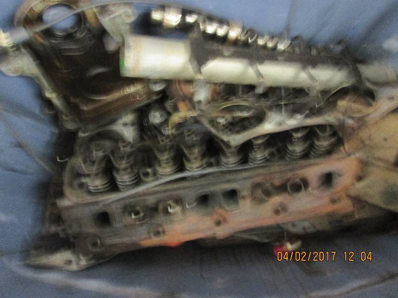 lot 18 image: misc engine parts 1 head, valve cov...
