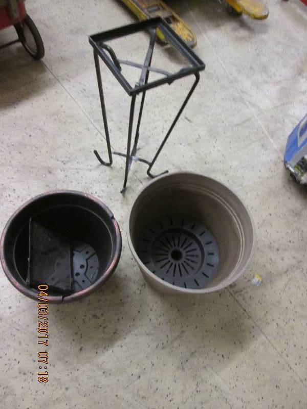 lot 31 image: metal plant stand and 2 flower pots...
