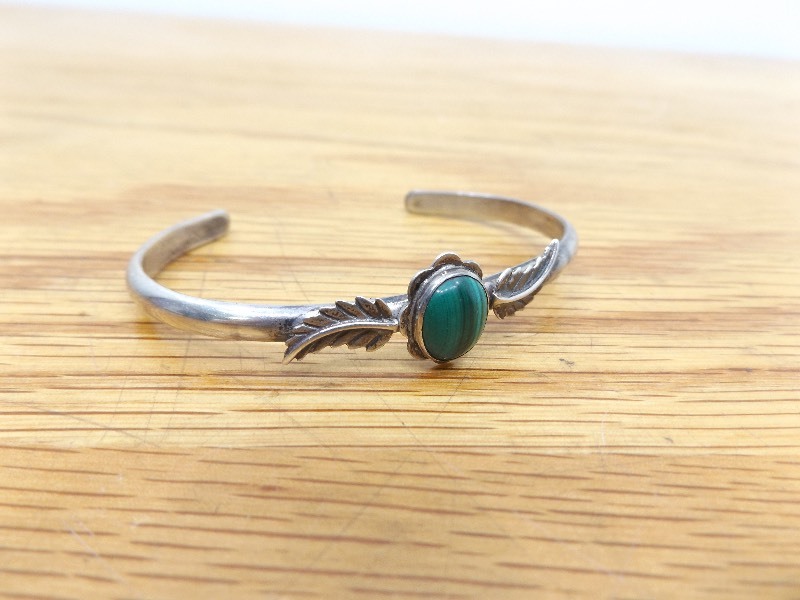 lot 34 image: Sterling Silver Bangle Bracelet with Green Stone (.720 oz Total Weight)