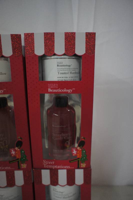 lot 135 image: Lot of 4 Baylis & Harding Beauticology Sweet Temptations Gift Set  -  1  10 oz Bottle of Strawberry Candy Cane Body Wash and 1  8.4 oz Can of Toasted Marshmallow Body Butter Per Set