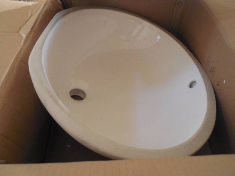 lot 16 image: ROUND VANITY SINK
