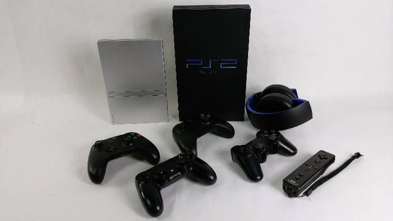 lot 77 image: For Parts Video Game Lot - PS2 Console, Controllers & More