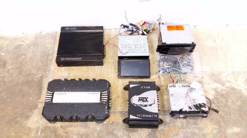 lot 86 image: For Parts Car Audio Lot Amps, Decks and DVD Players