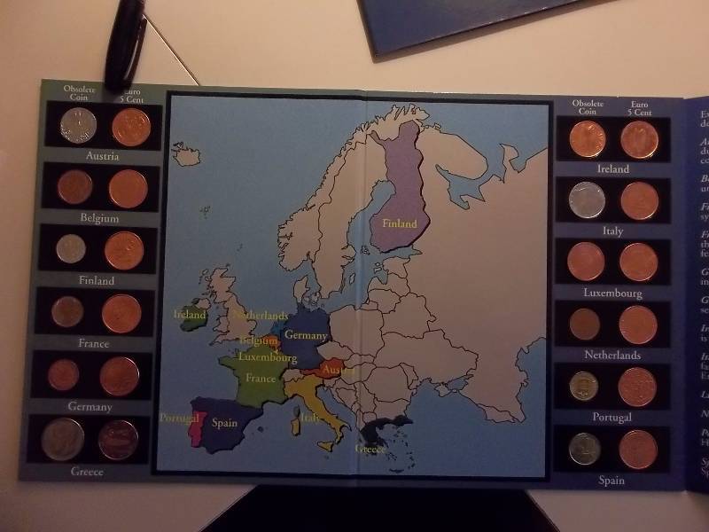 Euro Coin Collection With New Euro Coins And The Coins They Made Obsolete