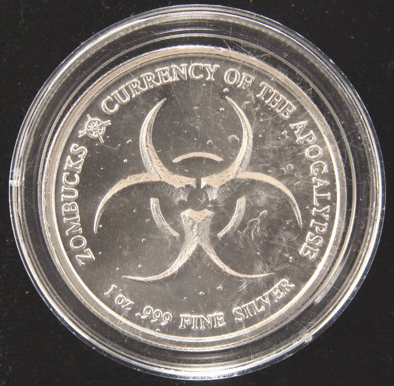 1 TROY OZ. .999 FINE SILVER ZOMBUCKS THE SAINT IN AIRTITE HOLDER