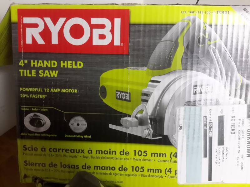 Ryobi 4 in Hand Held Tile Saw.. Dry or Wet