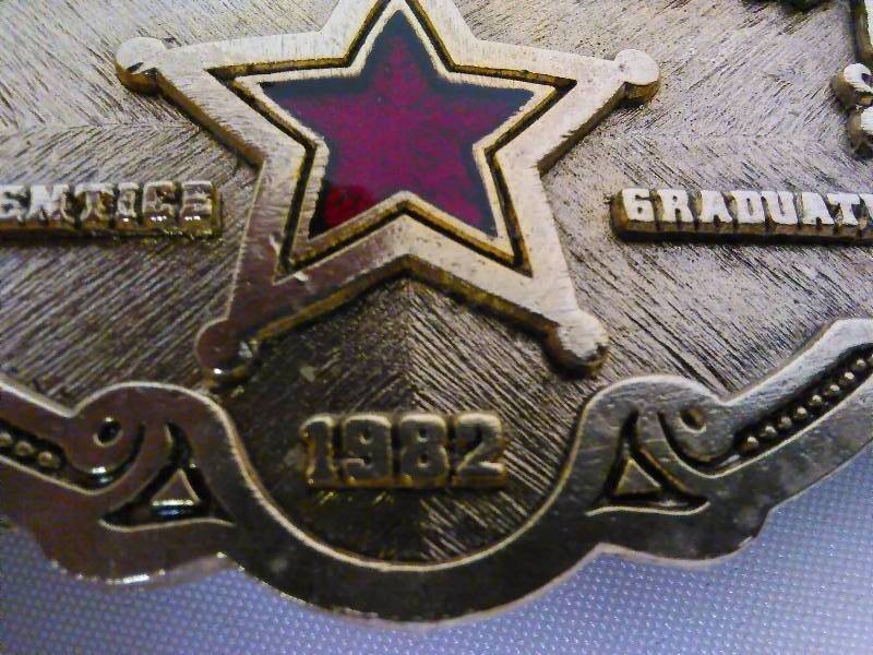 lot 161 image: Vintage Belt Buckle, Lone Star Steel, 1982, Gold colored with Red Star