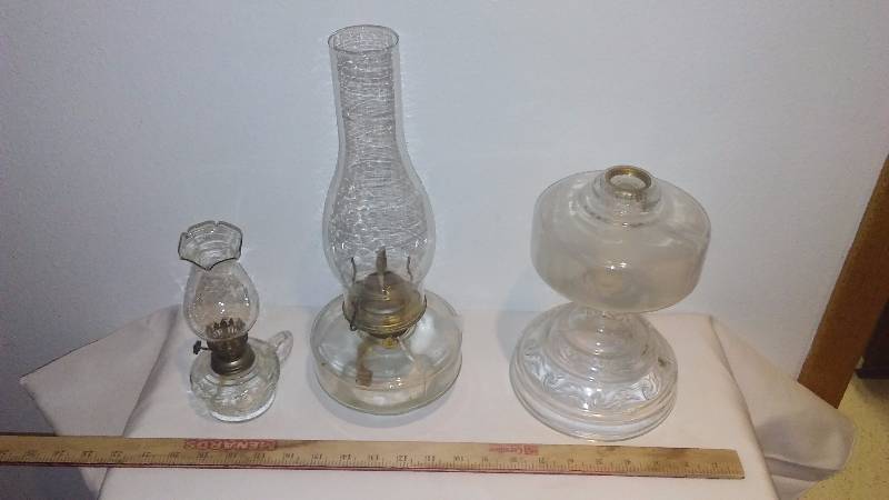 lot 11 image: Vintage Clear Glass Oil Lamps (3) Perfect for at the lake