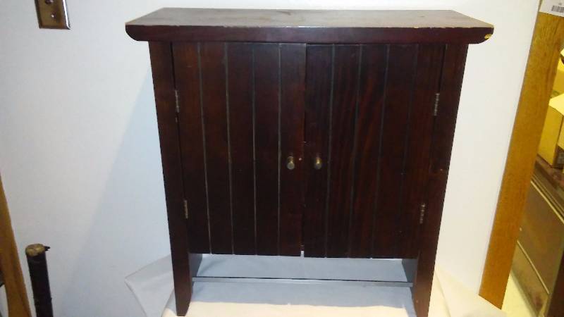 lot 33 image: Wall Cabinet with Shelf and Towel Rack, great for bathroom, utility and more 22 x 23.5 x 8 inches
