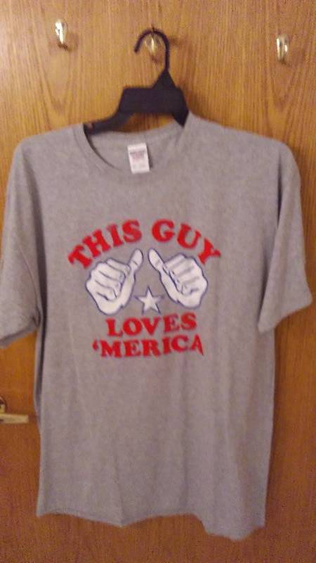 lot 112 image: This guy Loves America T shirt, XLT, NWT