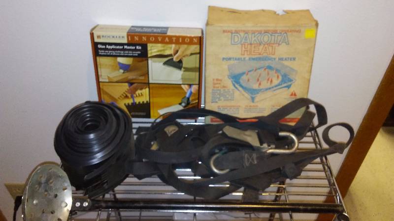 lot 124 image: Misc. Vintage Garage Items, Garage Door Replacement Seal, Emergency Heater