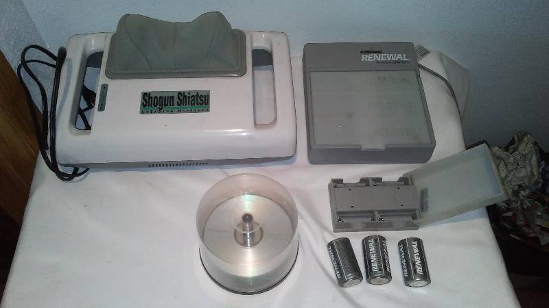 lot 128 image: Misc. Electronics, Shiatsu massager (works), Battery Charger (powers on, with some rechargeable) and more