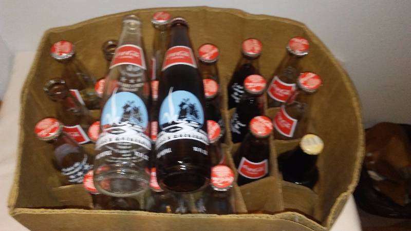 lot 134 image: ND Centennial Coke Bottles, (22) 1989, 5 full