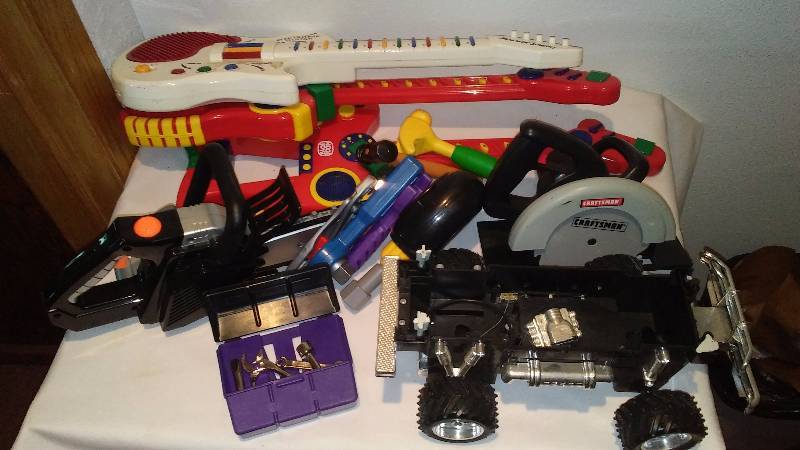 lot 137 image: Toy Lot, Guitars (3), Skill SawCraftsman, Misc. Tools, Chainsaw